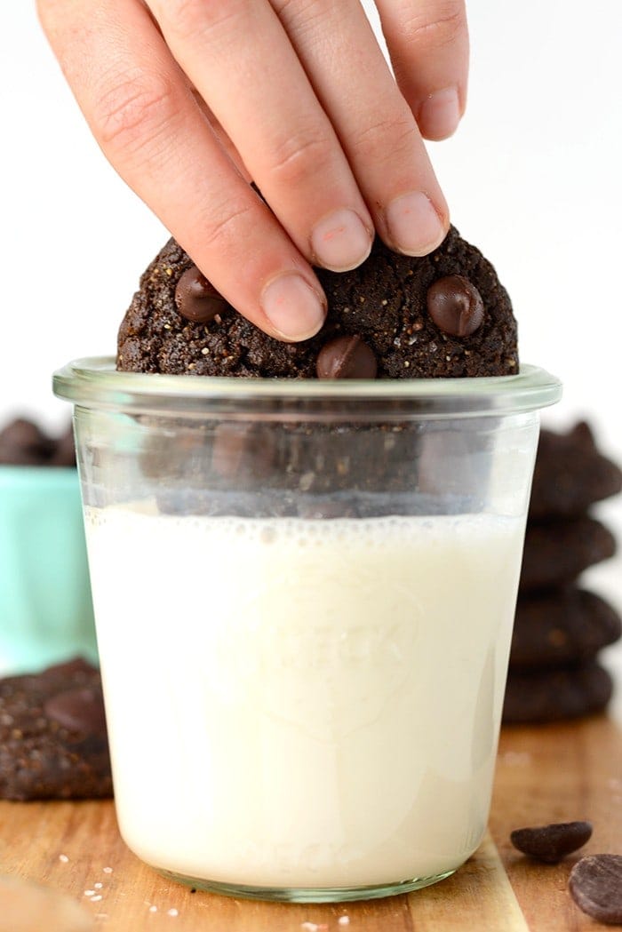 These double chocolate flourless peanut butter cookies are made sans flour, gluten, refined sugar, and butter! They're ooey gooey and taste like a cross between a peanut butter cookie and a brownie!