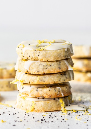 Lemon poppy seed cookies with icing and sprinkles.