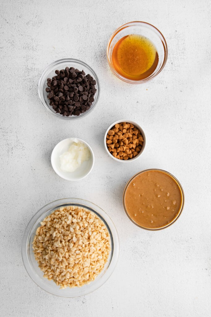 ingredients for healthy scotcheroos in small bowls ready to be mixed together