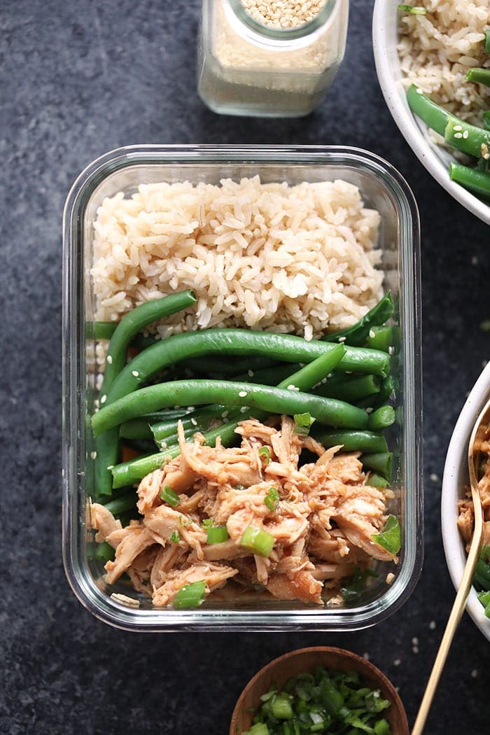 Honey garlic chicken with rice and green beans in a meal prep container. 