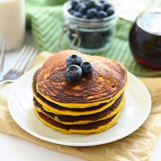 These are the best Paleo Coconut Flour Pancakes you'll ever make! They're made with just 4 main ingredients and a little coconut oil making them grain-free, dairy-free, and refined sugar free!