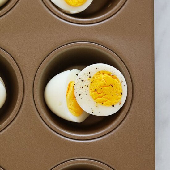 Hard boiled eggs baked in a muffin tin.